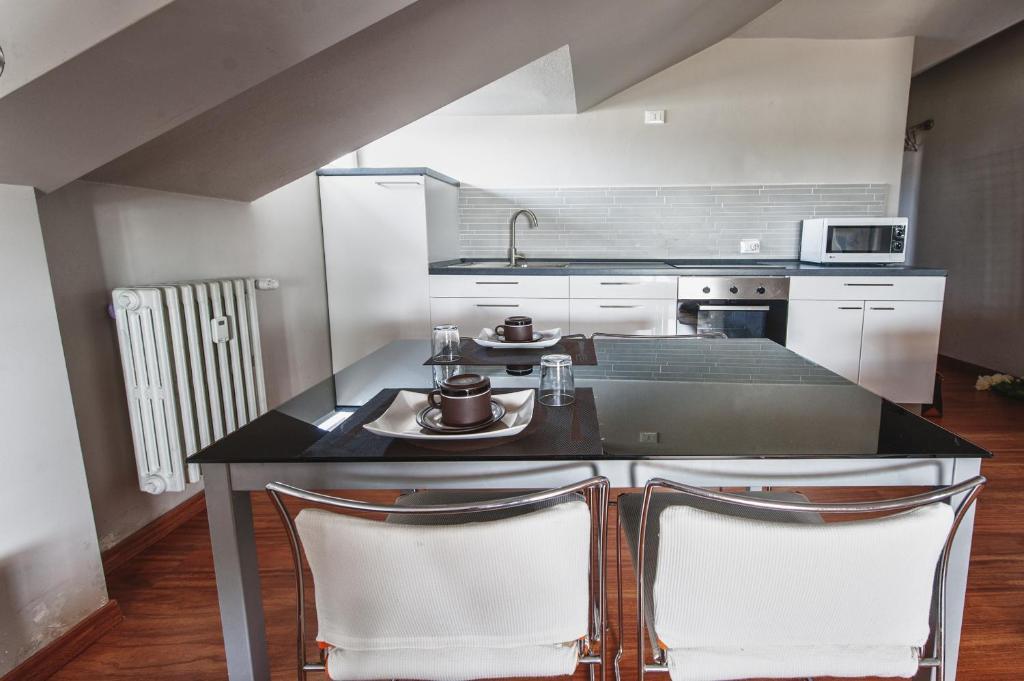 Cute & Cozy Terrace Apartment แบร์กาโม ห้อง รูปภาพ
